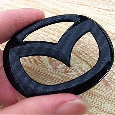 boc vo lang Che biển báo hướng xe Mazda Xingcheng M3 M6 Ruiyi trung tâm vô lăng logo áp dụng logo xe bọc vô lăng ô tô vô lăng honda city