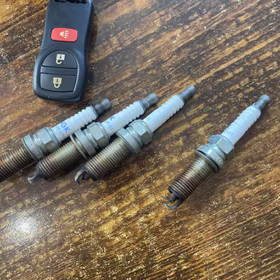 bugi bạch kim cho xe vios Bugi ô tô phù hợp với Nissan Sunshine cổ điển nguyên bản Sylphy Xintianlai Qida Qijun Liwei Yida nguyên bản vệ sinh bugi ô tô bugi honda