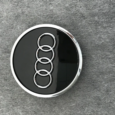Vỏ trung tâm Audi A3 A4 A6L Q3 Q5 Q7 A5 A7 A8 Q2 logo trung tâm vỏ lốp logo logo trung tâm lo go xe hoi tem dán kính lái ô tô