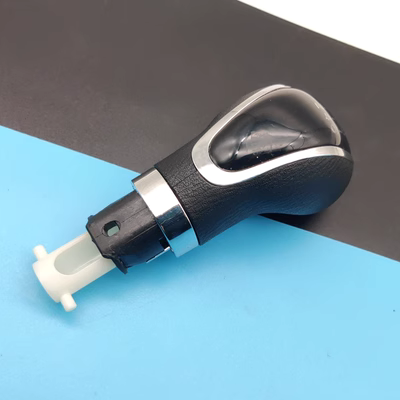 Thích hợp cho Trường An CS55 cần số che bụi cần số tay cầm đầu bánh răng cần số nắp bóng ném bánh đầu phụ kiện